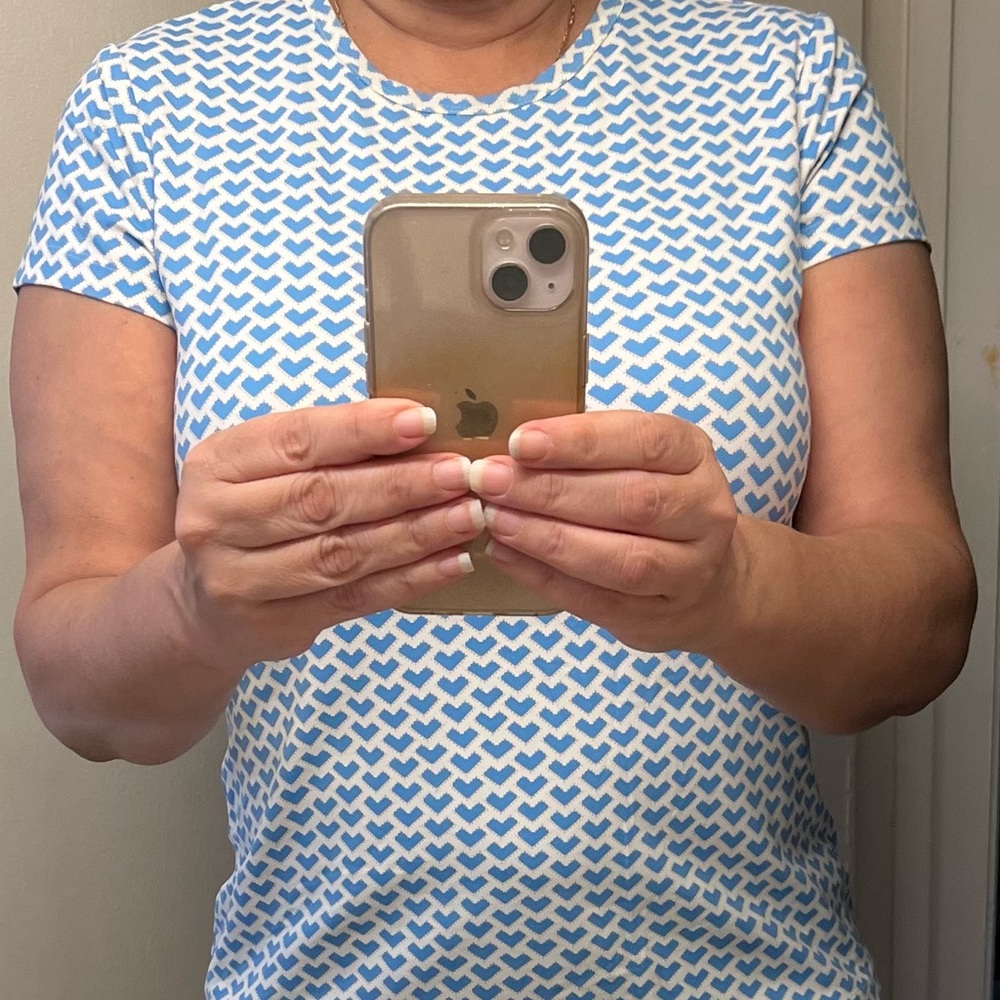Nice top to wear with Jeans or white pants!